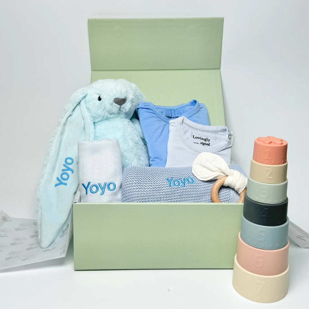 New Beginnings Baby Gift Set in Blue- Essential Clothings, Blanket, Wash Cloth, Bunny Soft Toy, Stacking Toy and Teether