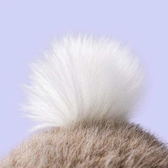 Close-up of the Jellycat Fawn Flufflet Bunny’s fluffy white tail against its soft taupe brown fur.