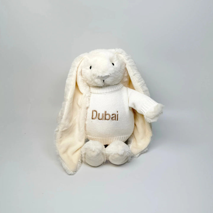 Premium plush bunny soft toy wearing personalized Dubai jumper gift.