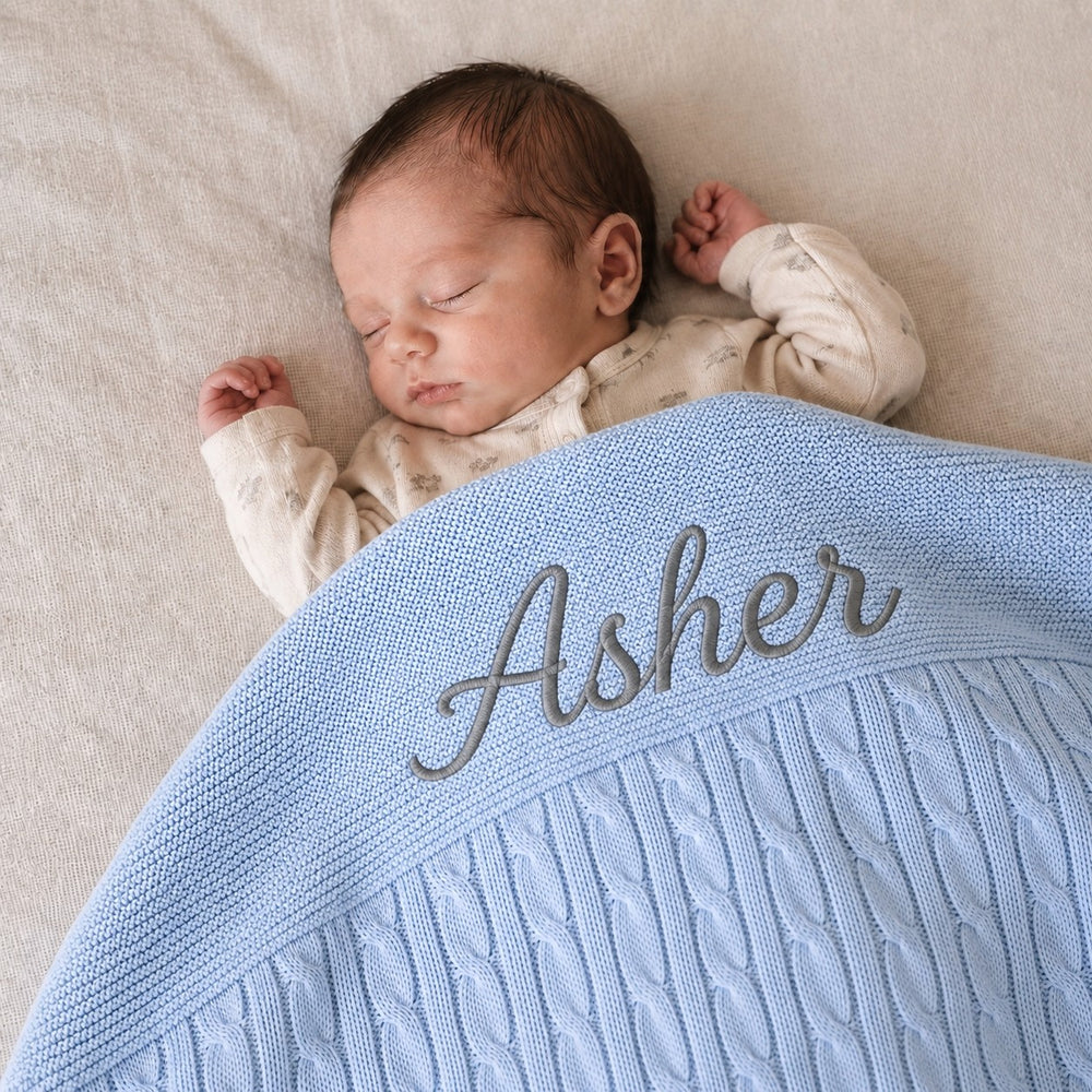 Personalized blue cable knit blanket. Luxurious, soft, and perfect for babies