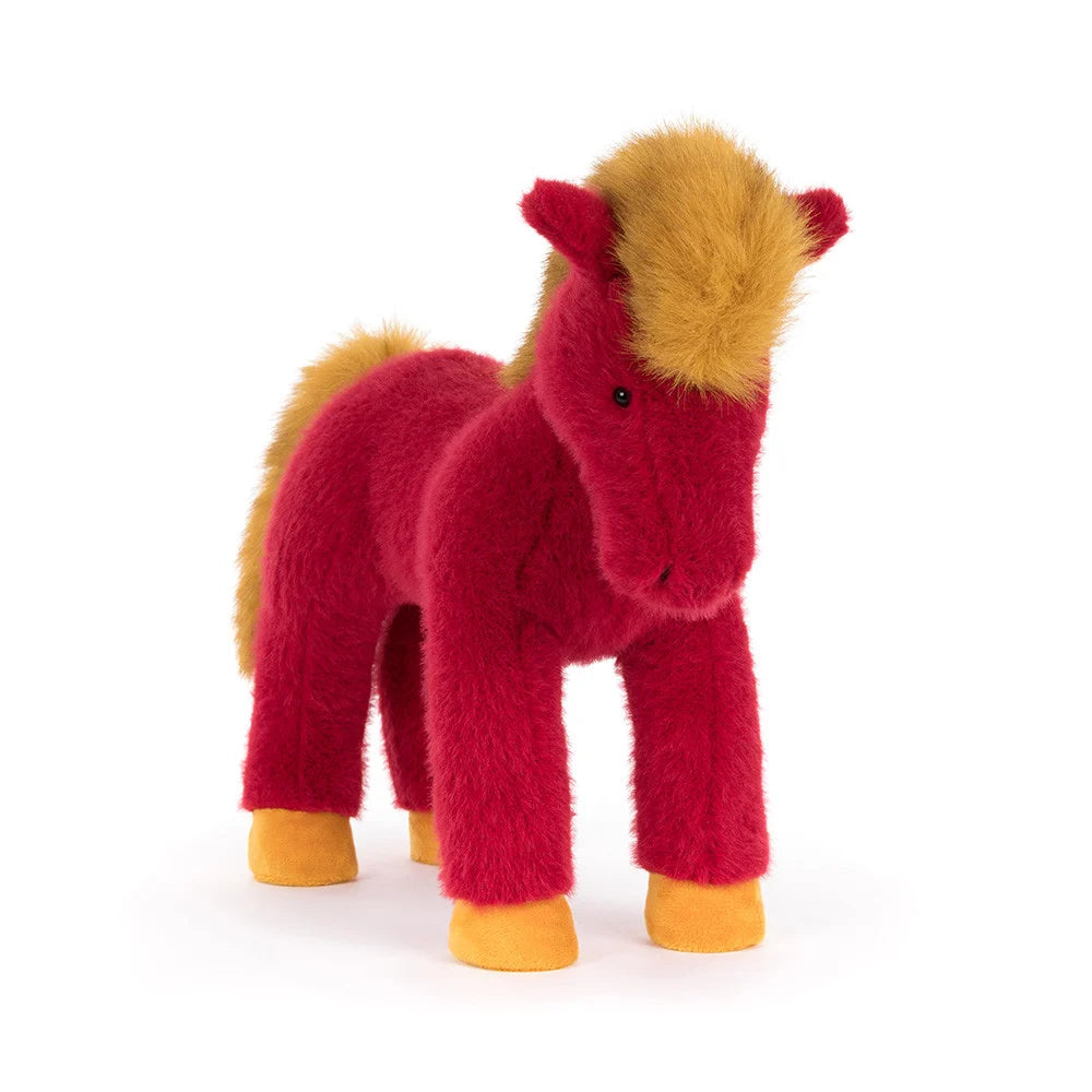 Jellycat Festival Horse plush in vibrant red with a golden mane, tail and hooves, photographed from the front on a white background.