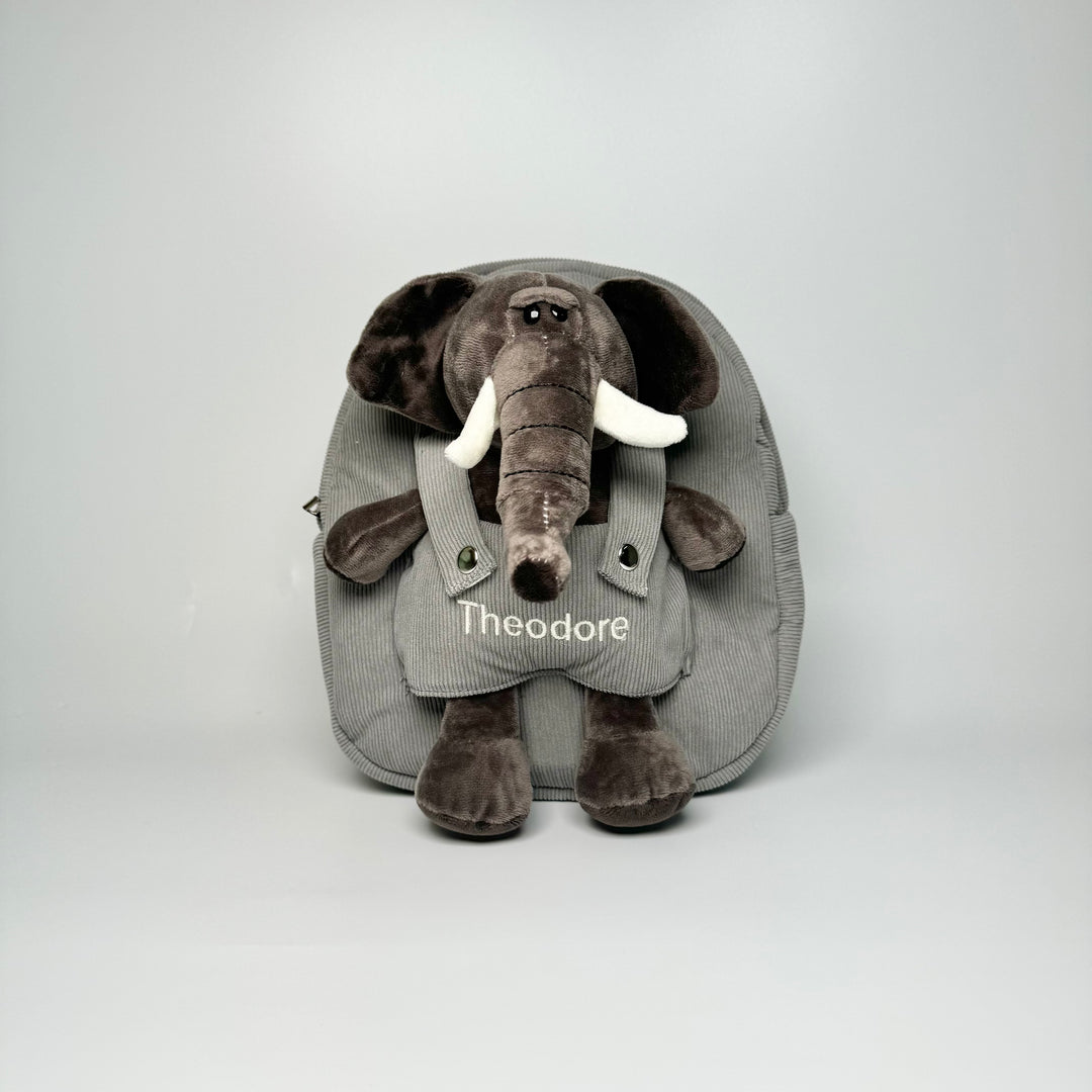 children backpack with elephant soft toy and "Theodore" personalised in cream thread