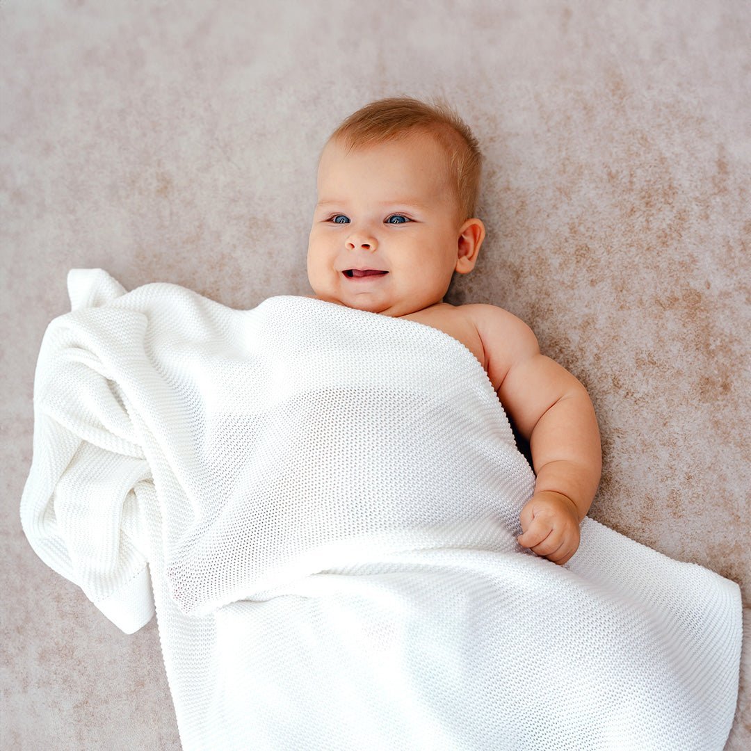 Baby using White Bamboo Cellular Blanket