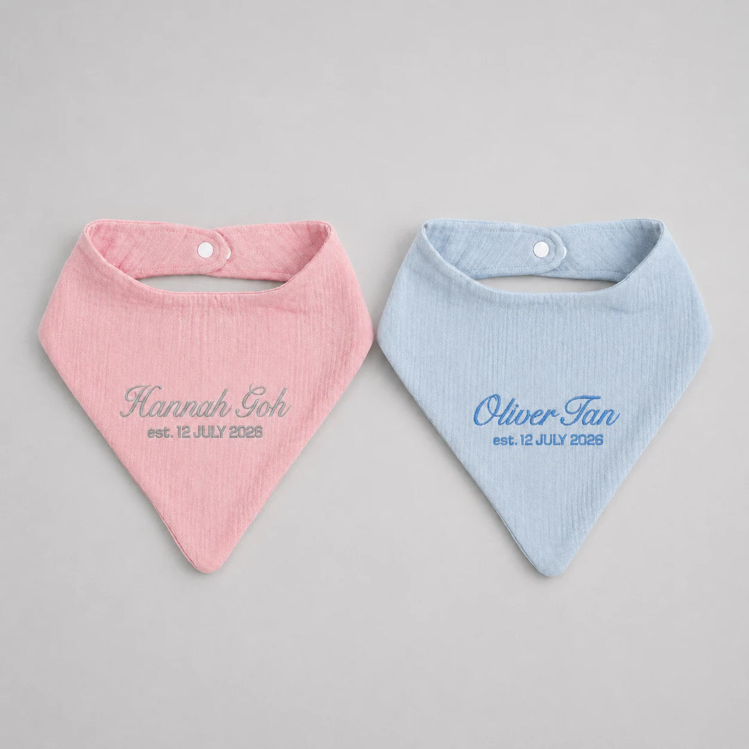 Personalised baby bib collection in pink, and blue with embroidered names and birth dates