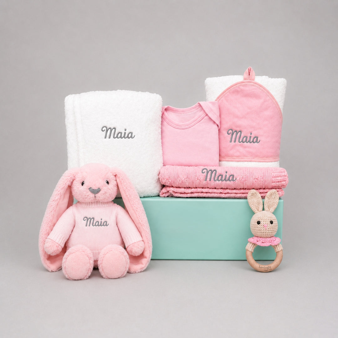 Baby gift set with plush toys and blankets in a box, personalized with 'Maia'.