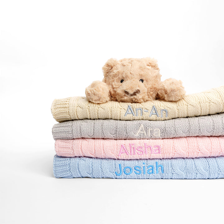 personalised Cable Knit Blanket in blue, cream, pink and grey