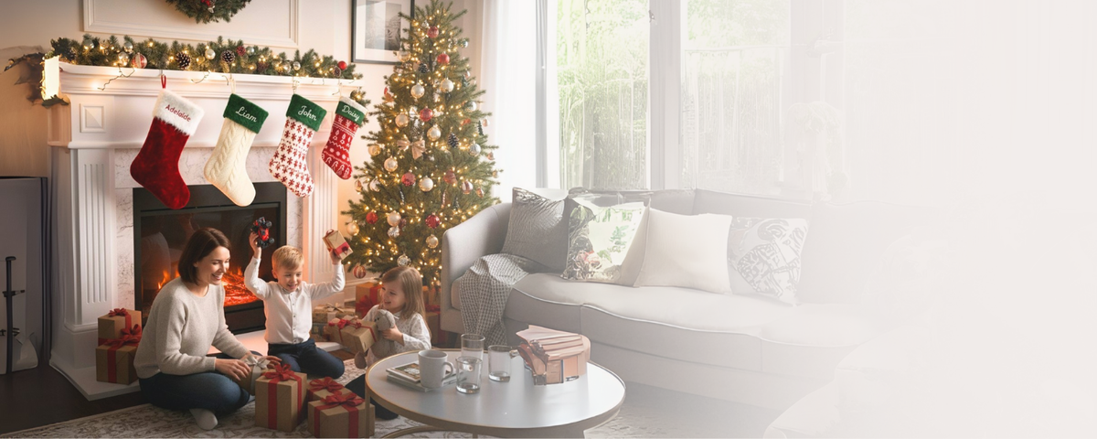 Cozy family on with personalized stocking by the fireplace 