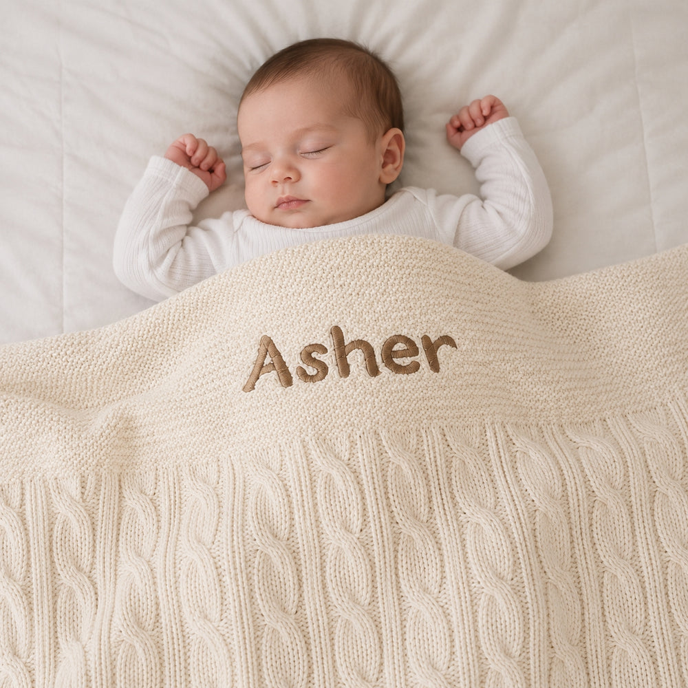 Baby using Cream Cable Knit Blanket 