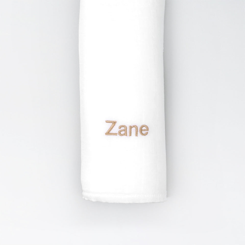 Personalized white bamboo muslin swaddle
