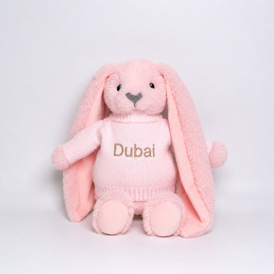 Premium plush bunny soft toy wearing customised Dubai jumper gift.