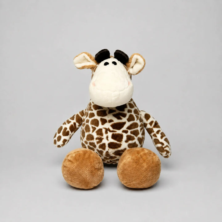Brown and cream giraffe soft toy with black horns, floppy arms and oversized feet, photographed from the front on a light grey studio background.