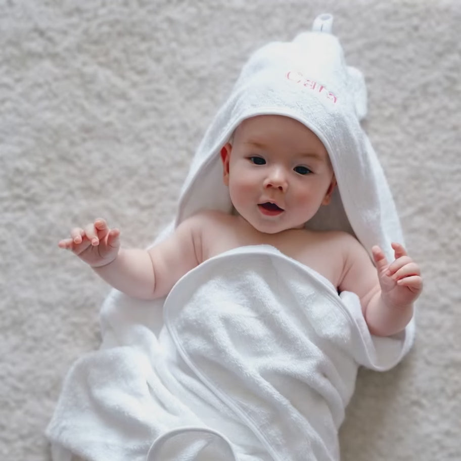 Short Video of Baby covering with White Hooded Towel