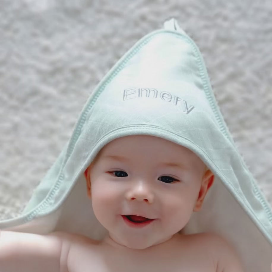 Short Video of Baby covering with Green Hooded Towel