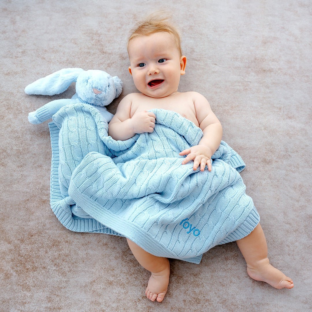 Baby covering in Blue Cable Knit Blanket