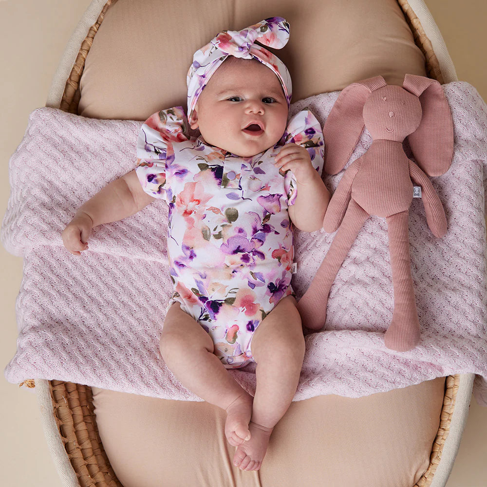 Baby wearing Snuggle Hunny Blushing Beauty Short Sleeve Organic Bodysuit with Frill