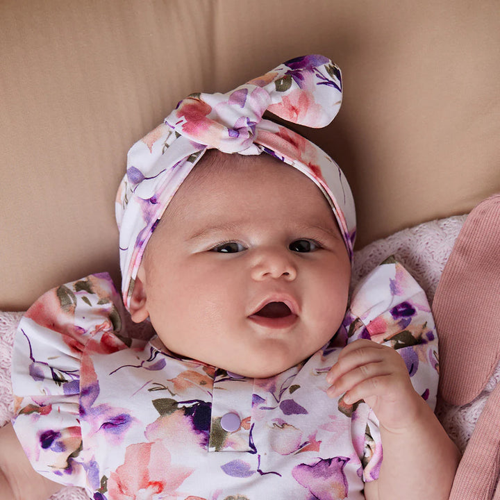 Baby wearing Snuggle Hunny Blushing Beauty Organic Topknot