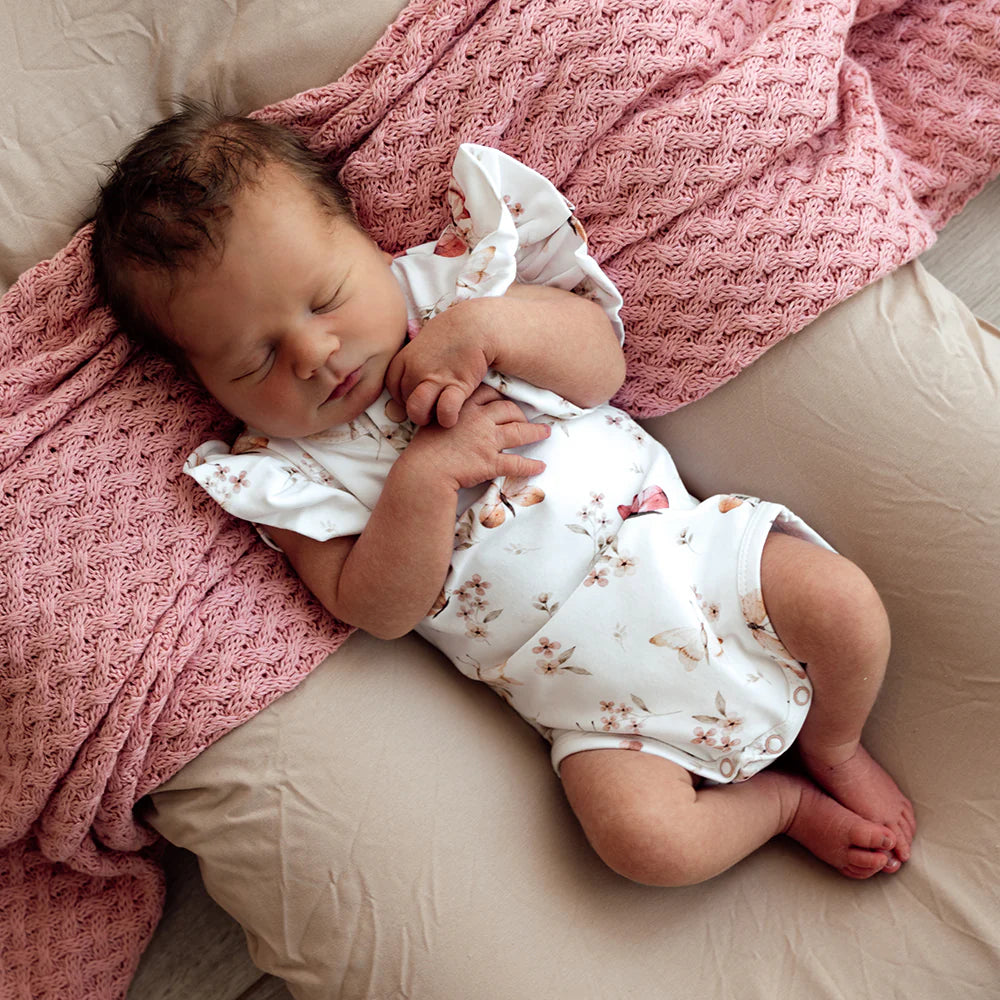 Baby wearing Snuggle Hunny Butterfly Short Sleeve Organic Bodysuit with Frill