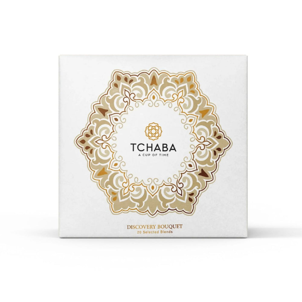 Tchaba tea packaging with decorative gold design on a white background