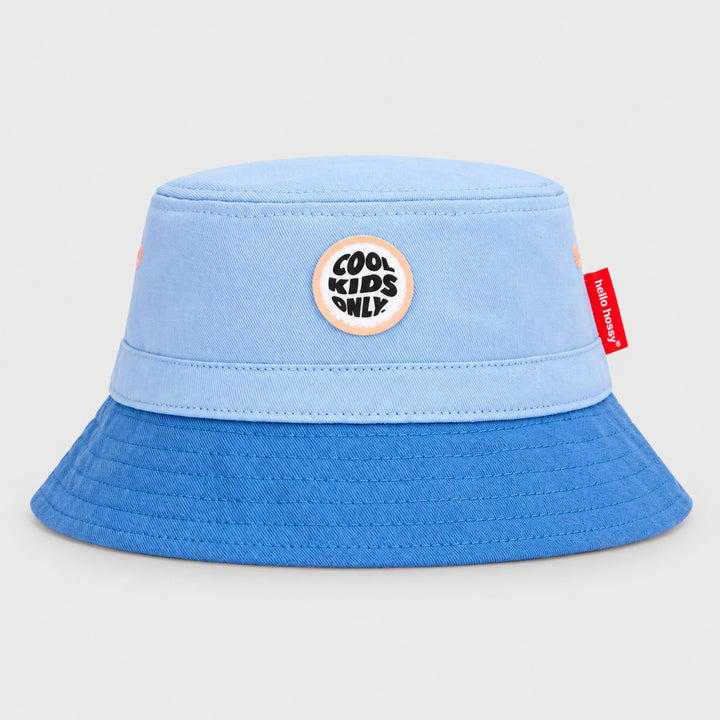 Hello Hossy light blue and royal blue bucket hat with “Cool Kids Only” front patch and red side tag.