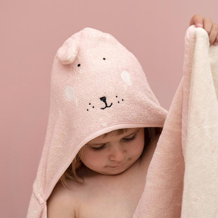 Toddler wearing a pink Trixie Bunny hooded towel after bath time, cute baby towel UAE