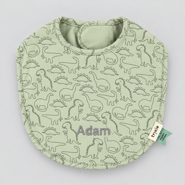 Personalised green Trixie dinosaur baby bib with Adam embroidered, UAE