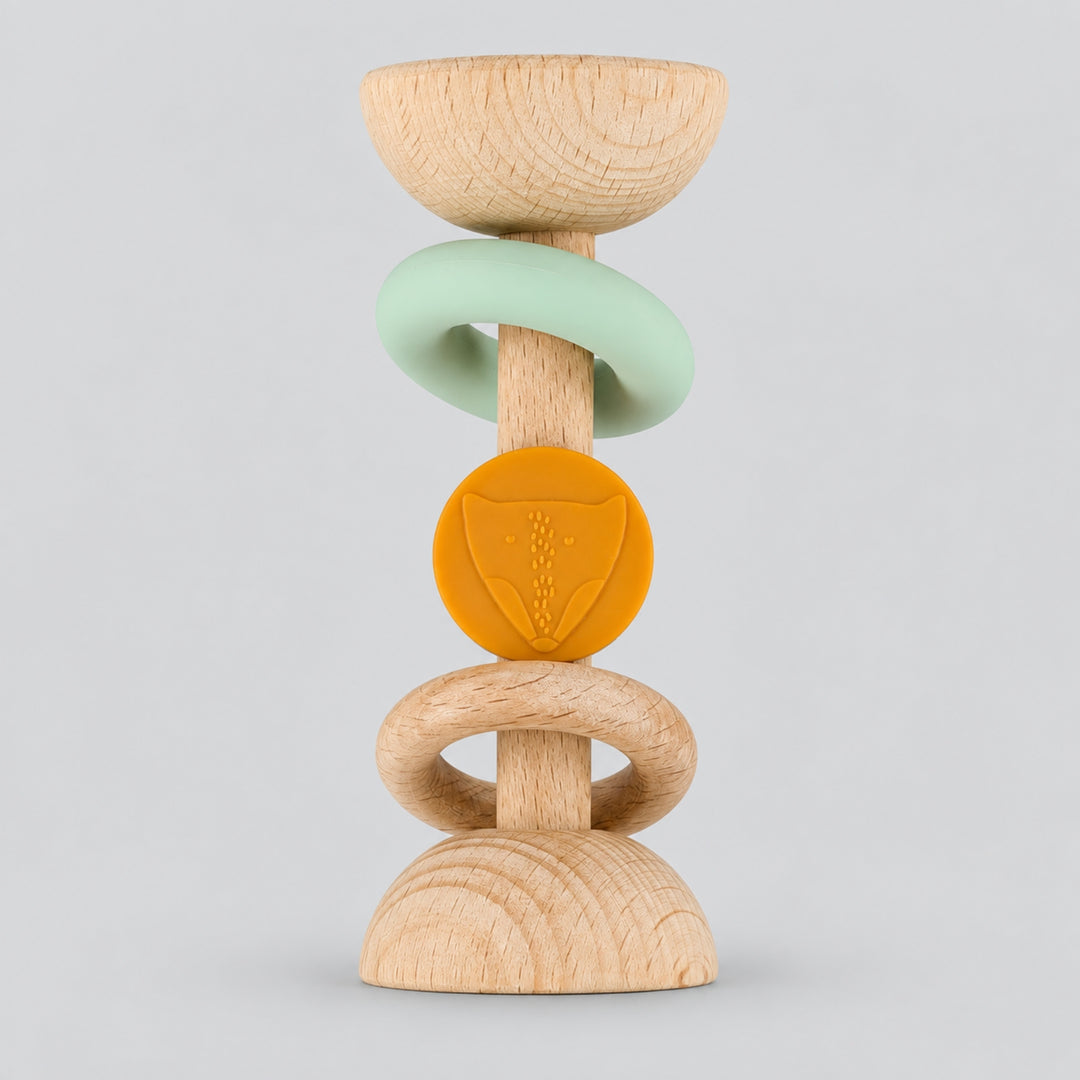 Trixie Fox wooden and silicone rattle teether with mint and orange details, baby toy UAE
