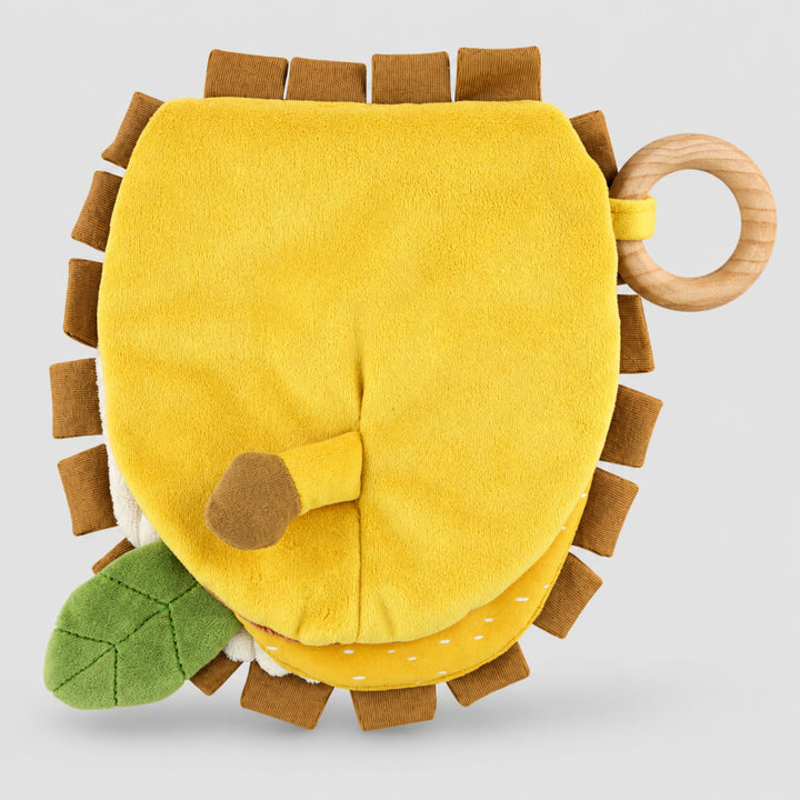 Back of Trixie Lion sensory book with soft tail and activity details, baby gift UAE