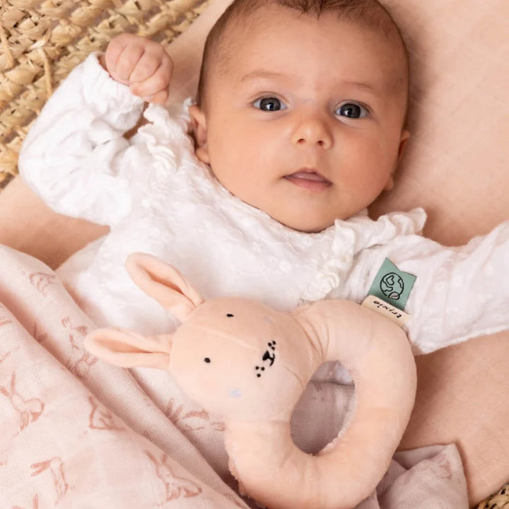 Baby with Trixie Rabbit soft rattle toy, newborn sensory toy UAE