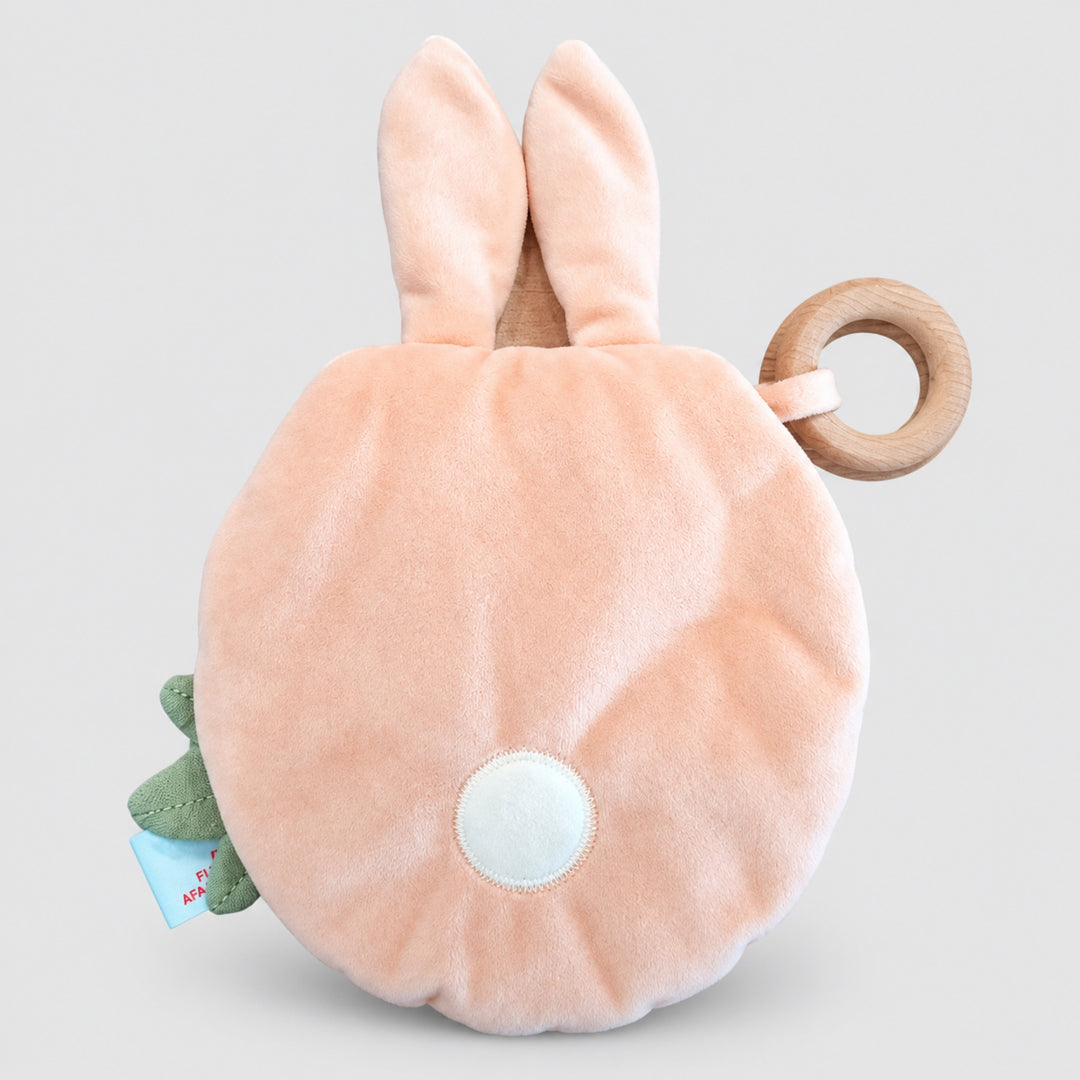 Back of Trixie Rabbit sensory book with soft bunny tail and wooden ring, baby toy UAE