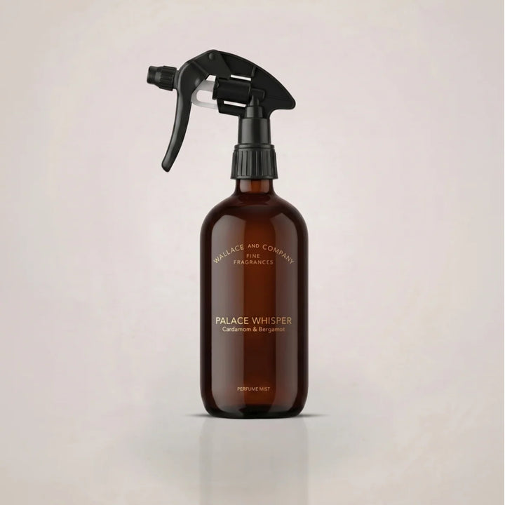 Wallace & Company Palace Whisper Cardamom & Bergamot Perfume Mist in an amber glass spray bottle with a black trigger.