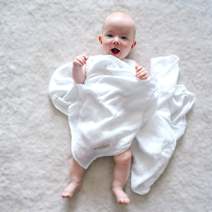 Baby covering in White Bamboo Swaddle