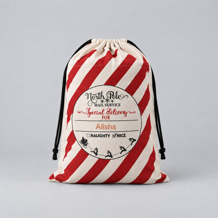 Personalised cream and red striped Christmas sack with North Pole Mail Service and Special Delivery design, finished with the name “Alisha”.